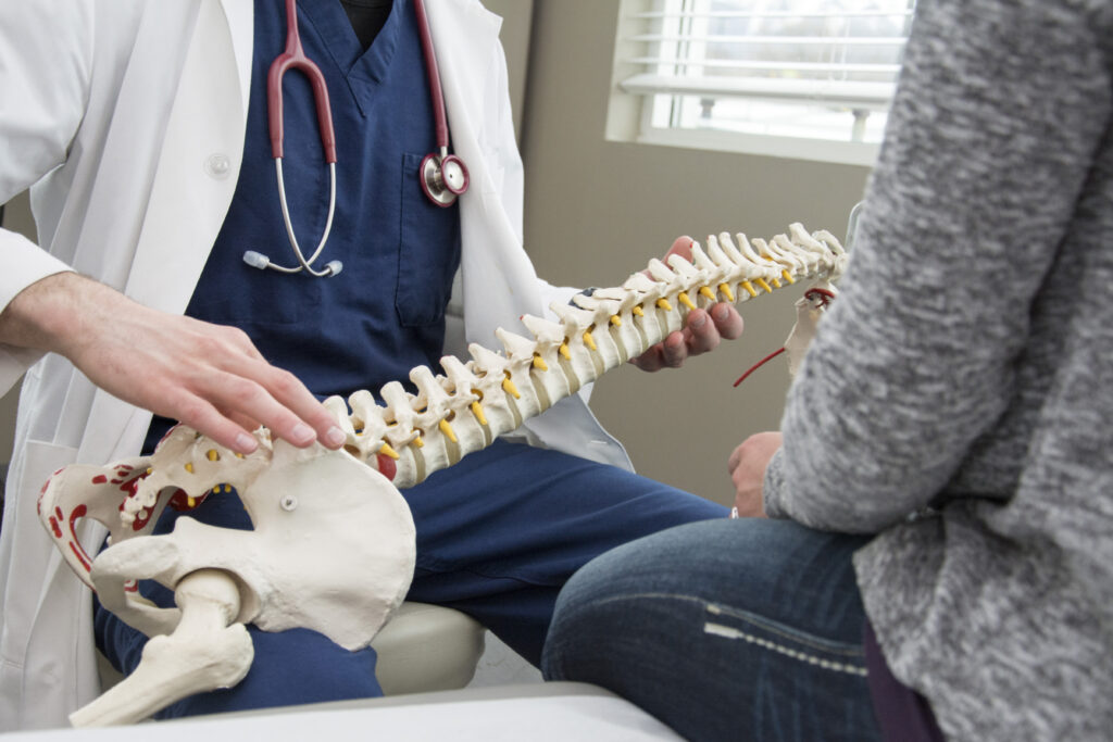 Doctor talking with a patient about their healthcare questions