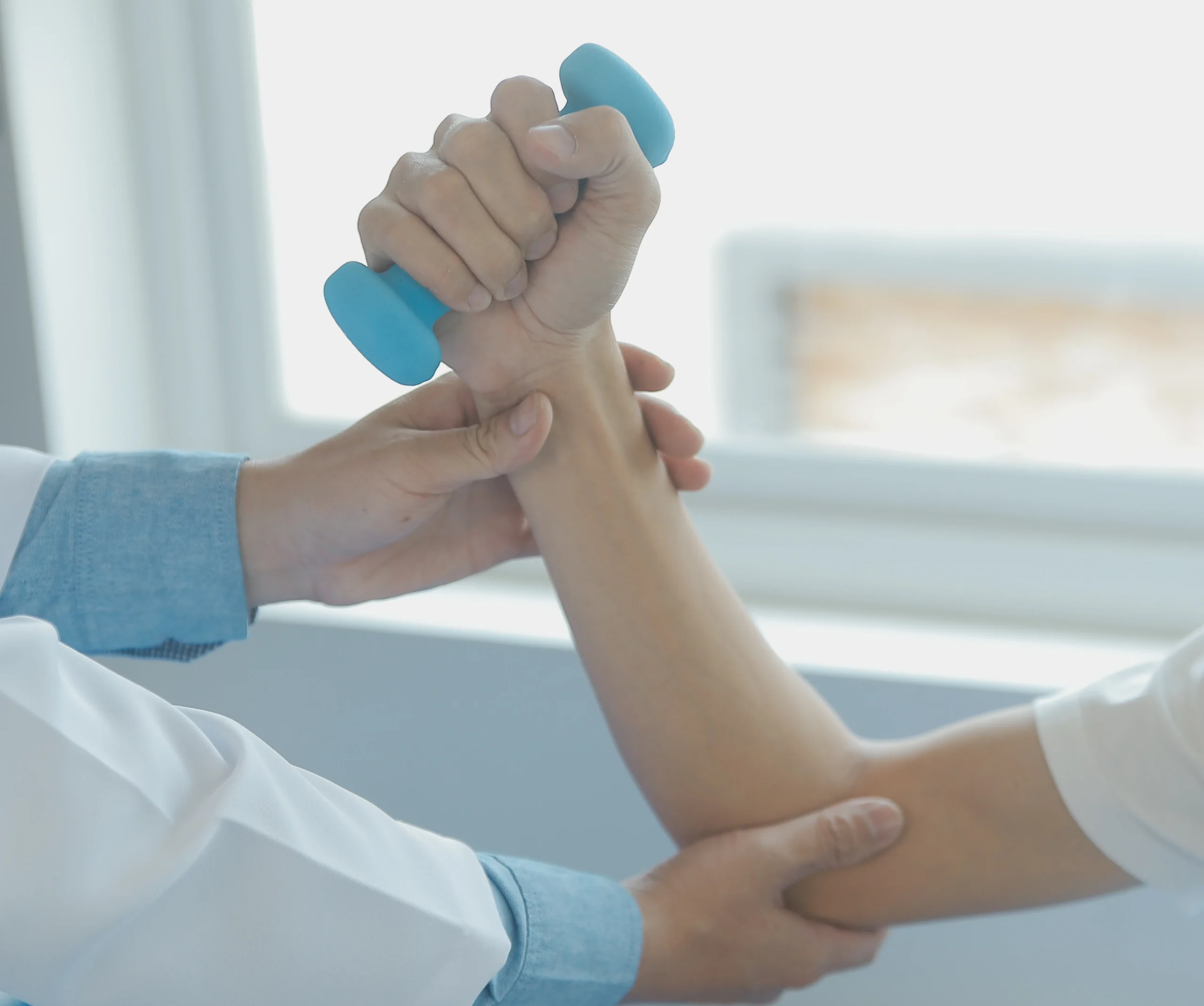 Doctor discussing carpal tunnel symptoms and treatment options with a patient
