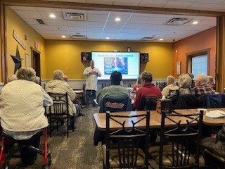Dr. Daniel Larsen teaching a continuing education seminar for fellow chiropractors