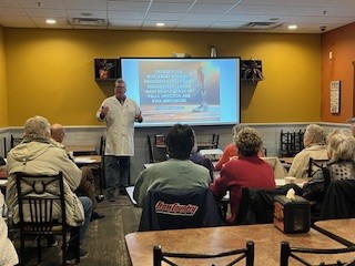 Dr. Daniel Larsen leading a chiropractic continuing education seminar