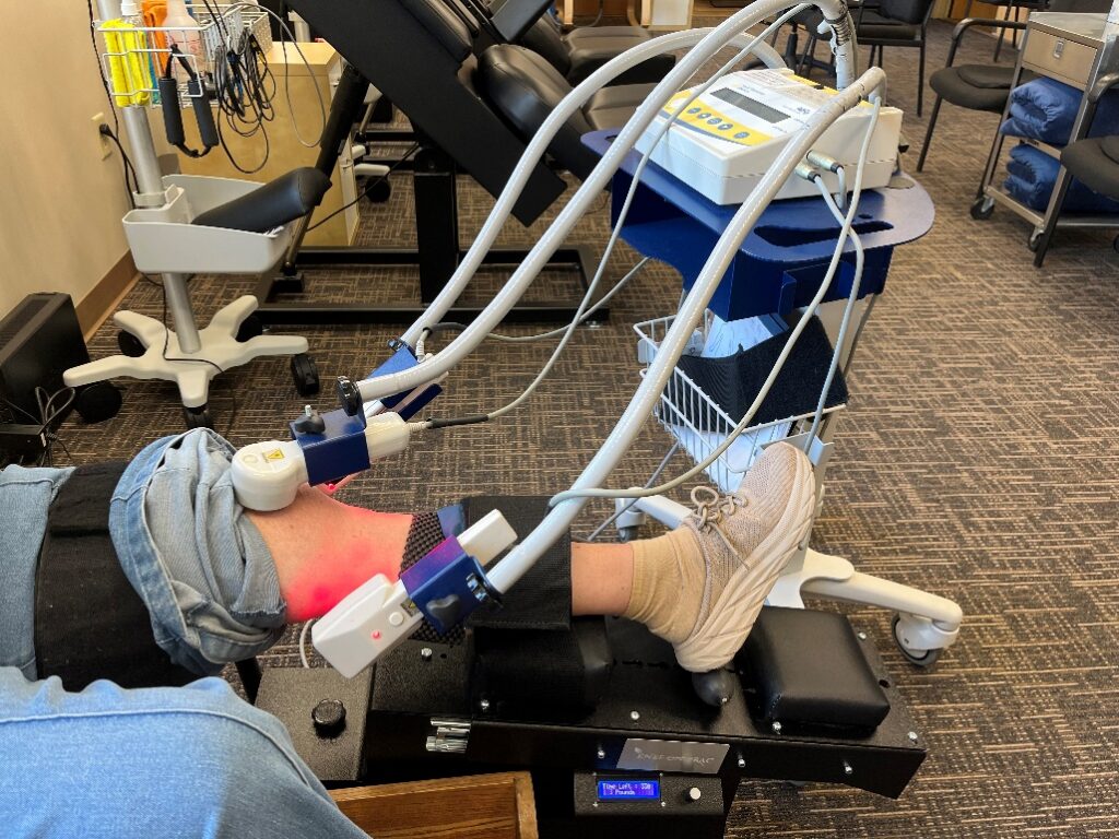Advanced laser therapy equipment at Twin Cities Chiropractic Spine and Injury Center