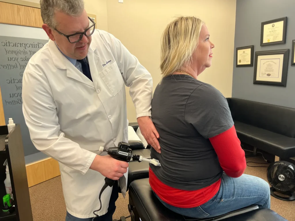Chiropractic exam of a patient's back at Twin Cities Chiropractic Spine and Injury Center