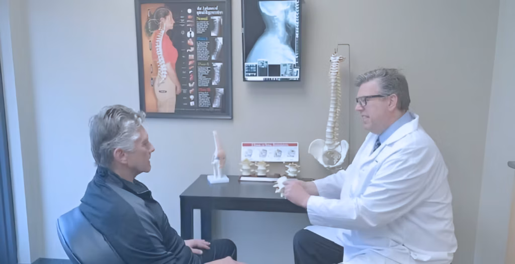 Dr. Larsen consulting with a patient about their treatment plan